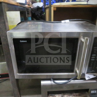 Galanz microwave, stainless steel, 120V, dimensions 20x13x12 inches. Front panel and handle visible.