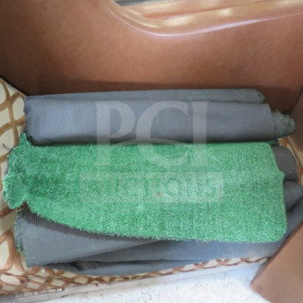 Assorted green turf rolls in varying sizes. Light wear, suitable for landscaping or decoration.