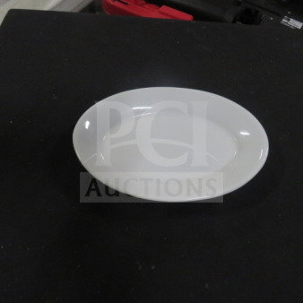 White 8x6 oval plate, smooth finish, excellent condition, on black background.