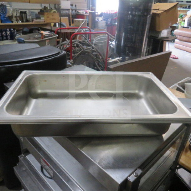 Full-size stainless steel chafer base pan, model 3XBID, in good condition, shown in a storage setting.