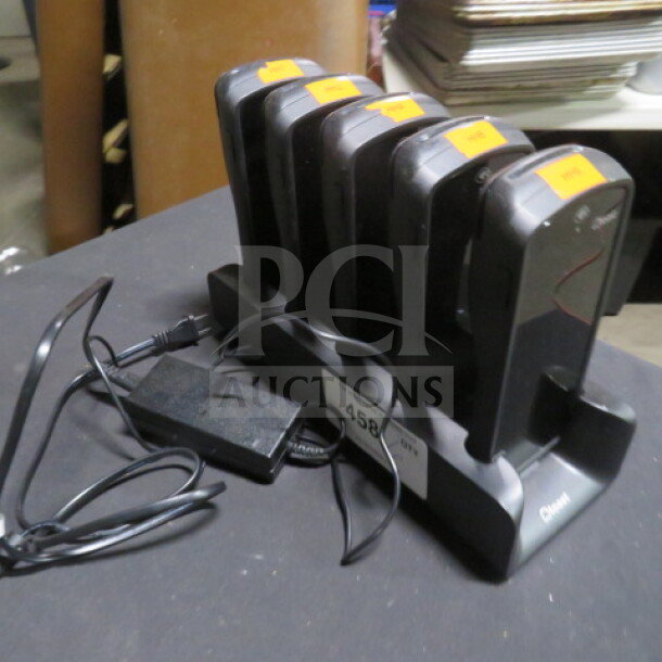 One Lot of TOAST Go 1 POS handheld terminals with charging station, Model# TG100. Includes 5 devices and 1 station.