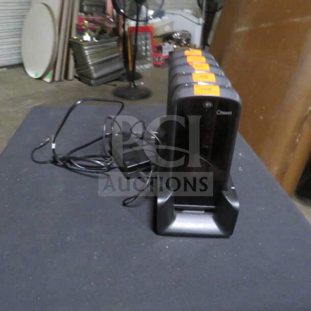 One Lot of TOAST Go 1 POS Handheld Terminals, Model TG100, with Charging Station. Includes 5 Toast Handhelds.