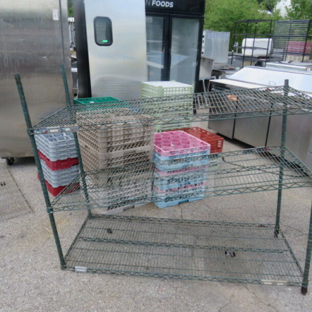 Metro metal shelf with three tiers, measuring 60x24x48 inches. Requires clips. Used condition.