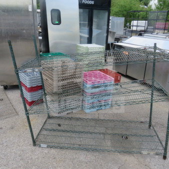Metro metal shelf with three tiers, measuring 60x24x48 inches. Requires clips. Used condition.