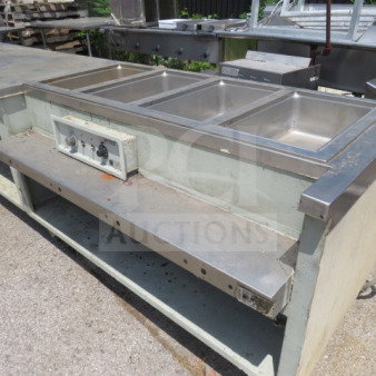 Wells 400 steam table/work table, 126x36x36, with 2 under shelves, stainless steel, 208/240V, visible control panel.