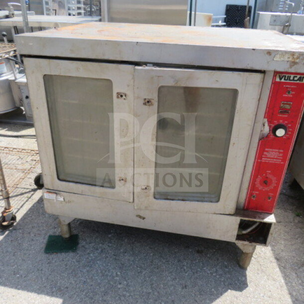 Vulcan VC4GD natural gas convection oven, no handles, 40x31x32 inches, used condition, visible control panel and glass doors.