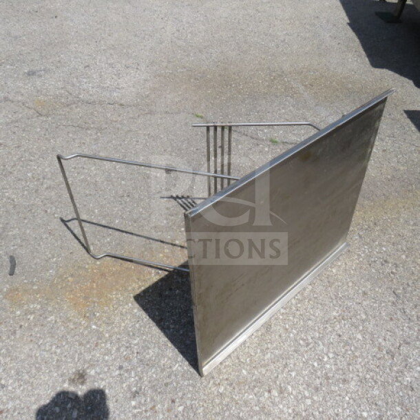 Ecolab SS dishwasher side table, stainless steel, 25x21 inches, sturdy design, minor surface wear visible.