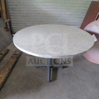 Round laminate table on pedestal base, measuring 48x30 inches. Shows minor wear, suitable for home or office use.