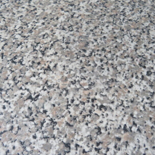 Round laminate table with a speckled granite finish on a pedestal base, measuring 48x30 inches.