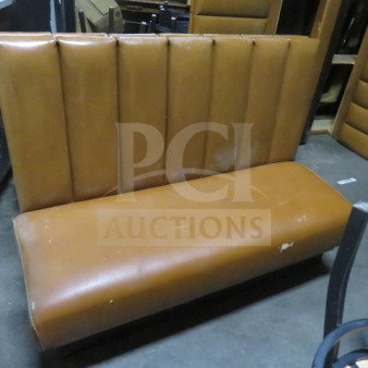 Brown single-sided cushioned booth with vertical stitching, showing wear on upholstery, suitable for restaurant or café use.