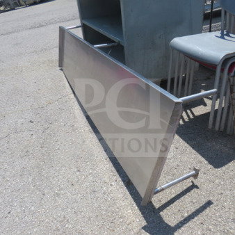 Stainless steel shelf, 96x22x13 inches, good condition, suitable for industrial or commercial use.