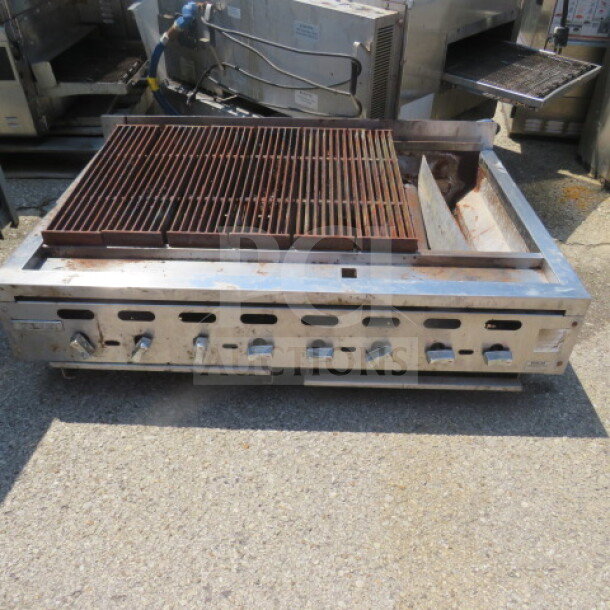 Vulcan CB48 natural gas charbroiler, stainless steel body, used condition, visible control knobs, spacious grilling area.