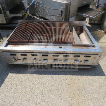 Vulcan CB48 natural gas charbroiler, stainless steel body, used condition, visible control knobs, spacious grilling area.