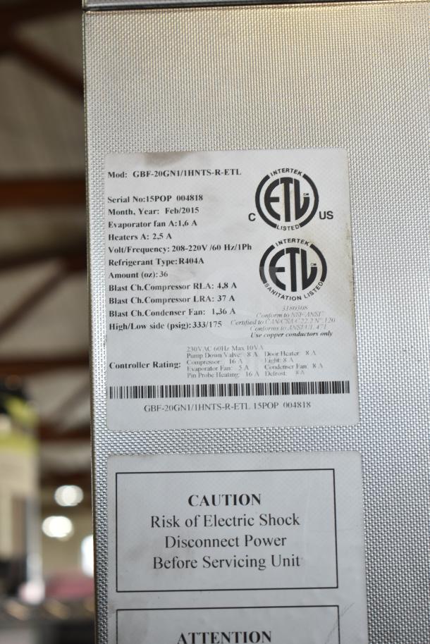 Desmon GBF-20GN1/1HNTS-R-ETL Roll In Rack Blast Chiller. Labels show model, voltage, and safety warnings.