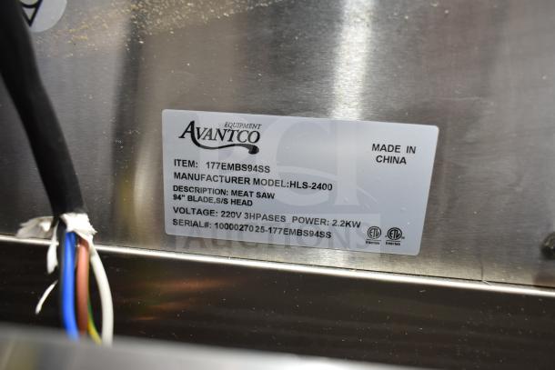 Alt text: Avantco 177EMBS94SS label on stainless steel meat saw, 94" blade, 220/240V, 3-phase, 2.2KW, serial #1000027025.