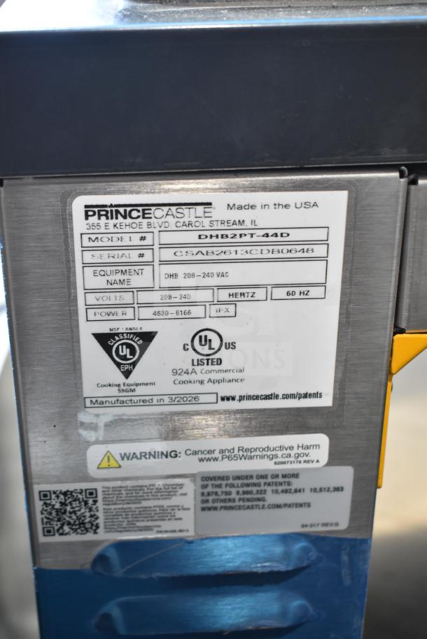 Brand new 2026 Prince Castle DHB2PT-44D holding bin, 2 shelf/4 pan, 208-240V, model number visible, UL listed.