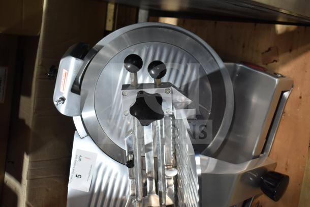 Brand new Avantco ASM0013 13" meat slicer, features blade sharpener, manual use option, 3/4 hp, 120 volts, minor surface dents.