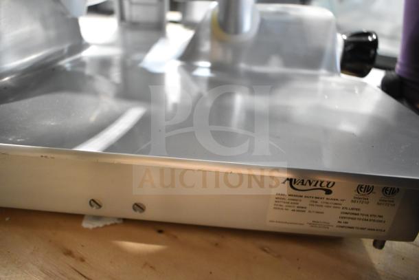 Avantco ASM0013 13" medium-duty automatic meat slicer, brand new with scratches. Features manual use option, blade sharpener, 3/4 hp, 120V.