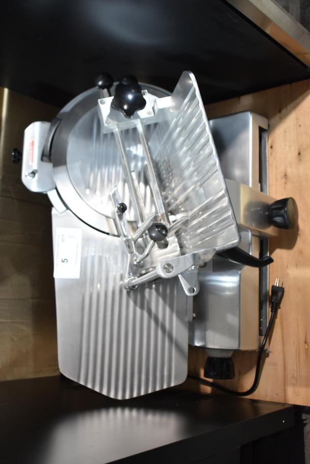 Brand new Avantco ASM0013 13" meat slicer, medium-duty, automatic/manual, 3/4 hp, 120V, with blade sharpener.