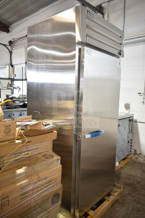 Brand new True STG1FRI-1S-HC commercial single door roll-in freezer, 115 volts, 1 phase, stainless steel, scratch and dent condition.