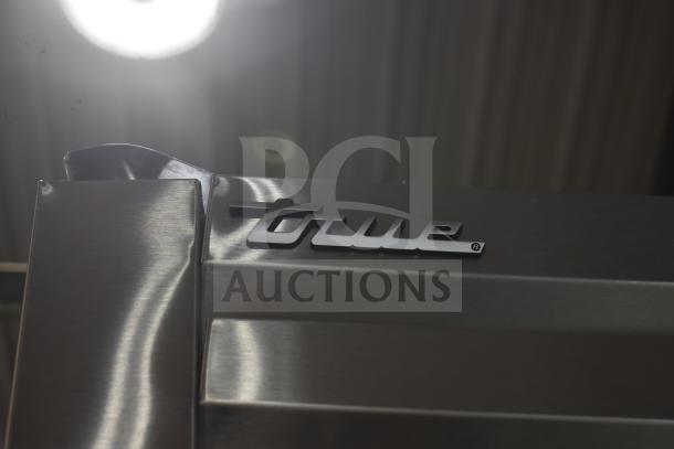 Brand new True STG1FRI-1S-HC commercial single-door roll-in freezer, scratch and dent, stainless steel exterior.