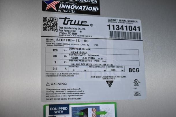 Alt text: Label of True STG1FRI-1S-HC commercial freezer, 115V, 1 Phase, R290 refrigerant, 2026 model, made in USA.