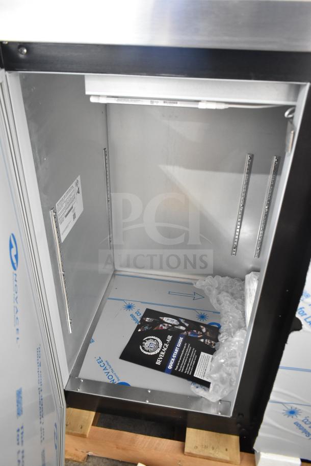 Brand new Beverage Air BB48HC-1-B-27 back bar fridge. Inside view, solid black doors, quick start guide, and protective packaging visible.