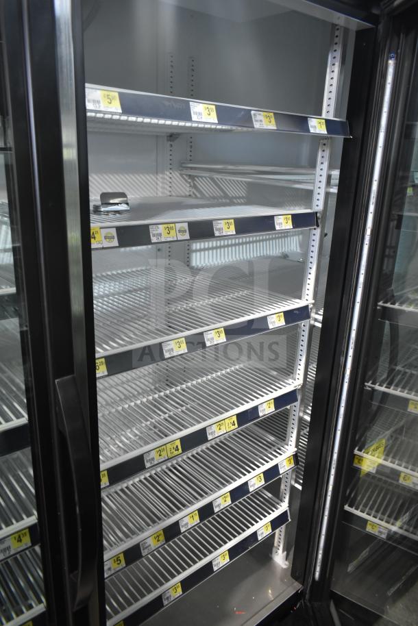 2019 True GDM-72-HC commercial cooler, 3 glass doors, retail price tags, 115V, 1 phase, excellent condition.