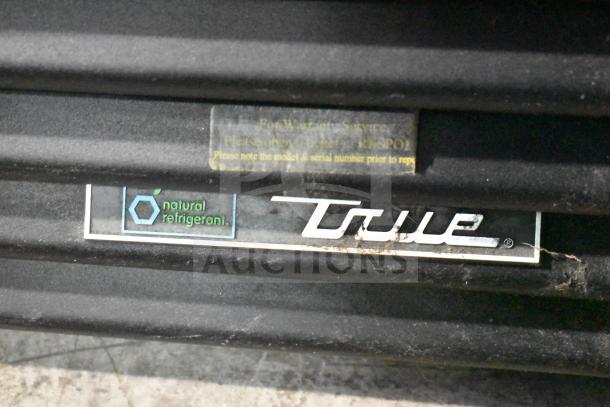 2019 True GDM-72-HC Cooler, 3 Door Merchandiser with natural refrigerant label and True logo, 115V, 1 Phase.