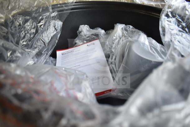 Brand new Avantco 177RCB90 electric rice cooker/warmer, 90-cup capacity, visible warranty document. Item includes protective packaging.