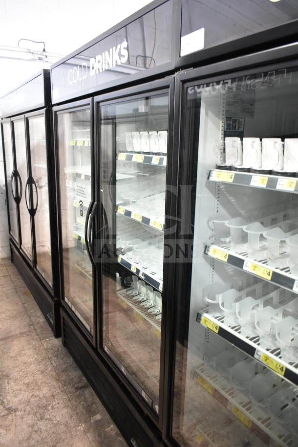 2019 True GDM-49-HC commercial cooler, 2-door, glass front, 115V, labeled "COLD DRINKS," clean condition.