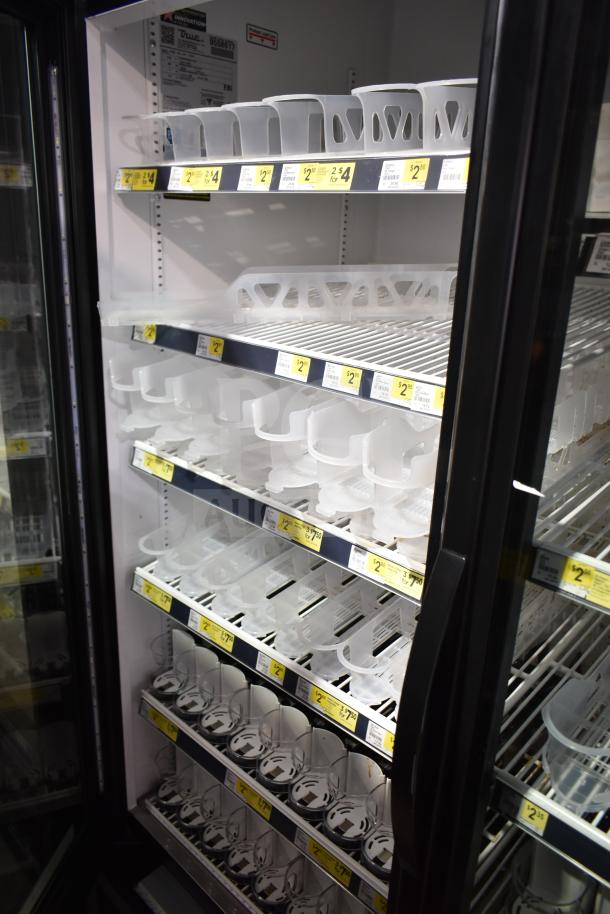 2019 True GDM-49-HC 2 Door Cooler Merchandiser, empty shelves, visible price tags, 115V, 1 Phase, excellent condition.