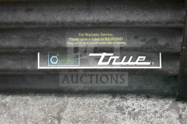 2019 True GDM-49-HC cooler label showing "natural refrigerant" and warranty instructions for RESPOND service.