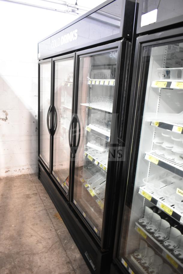 2019 True GDM-72-HC 3-door reach-in cooler merchandiser, 115 volts, great condition, glass doors, adjustable shelves.