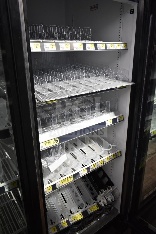 2019 True GDM-72-HC 3-door reach-in cooler merchandiser, 115V, shelving visible, clean condition, ideal for commercial use.