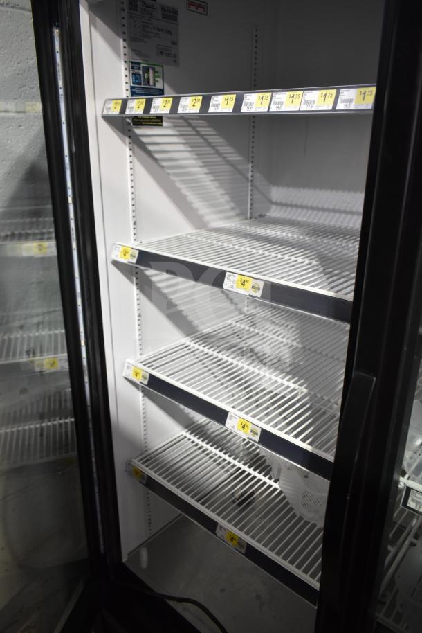 2019 True GDM-72-HC 3-door reach-in cooler, commercial-grade, shelves labeled with pricing tags, 115V, 1-phase.