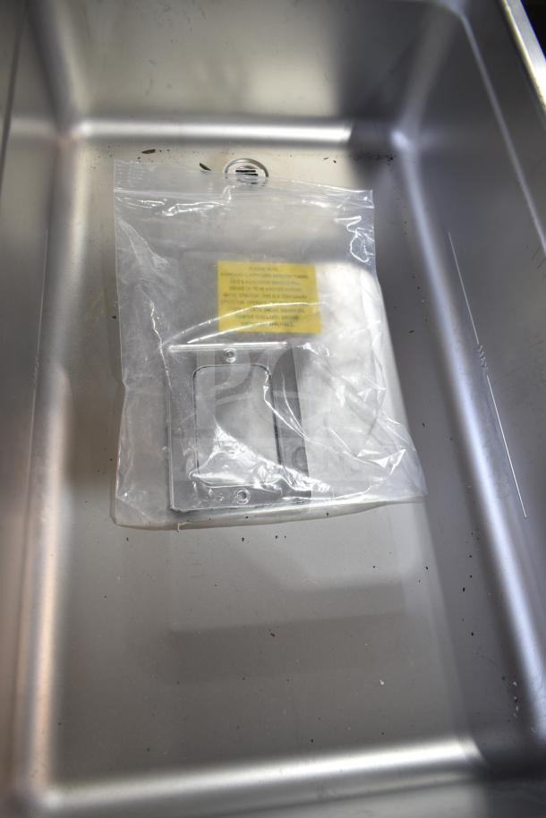 Brand new Hatco HWBI-FULD hot food well, stainless steel, with visible drain and included installation hardware in a bag.