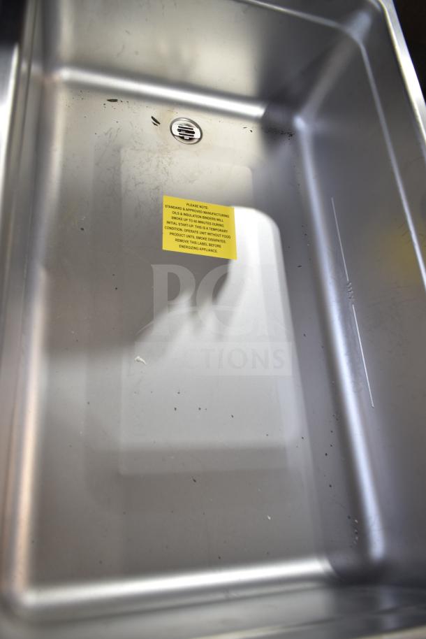 Brand new Hatco HWBI-FULD single drop-in hot food well, 208V, 1 phase. Insulated with drain, visible label with usage warning.