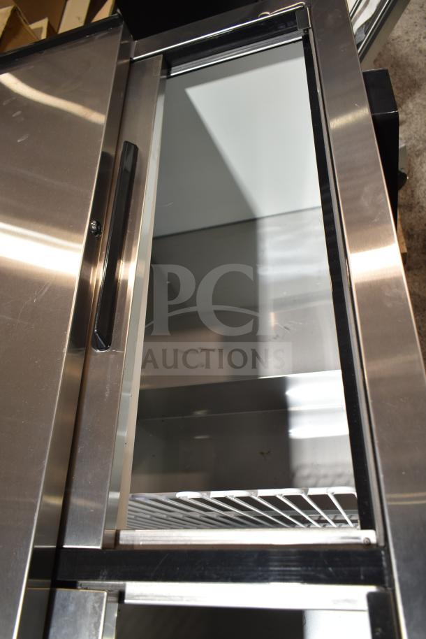 Brand new Avantco 178HBB95HC 95" black horizontal bottle cooler, sliding lids, 115V, minor scratches, interior view.