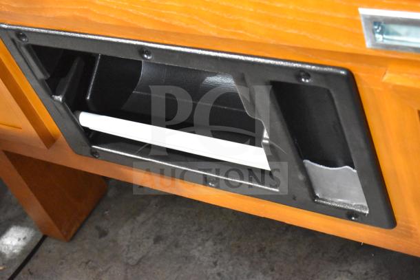 Avantco 178HBB95HC display case with wood pattern, black panel, and visible interior mechanism. Brand new, minor dents.