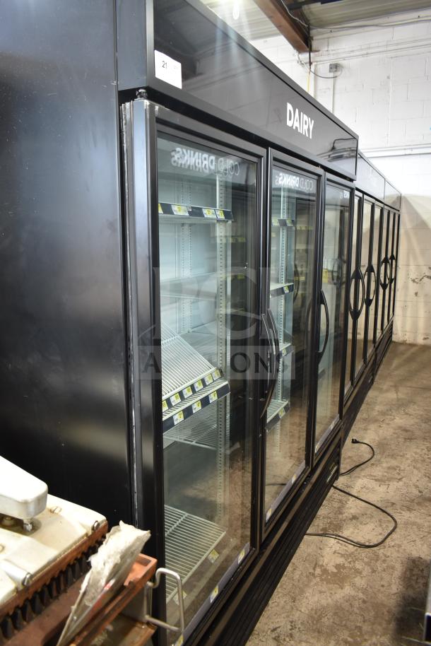 2019 True GDM-72-HC commercial 3-door cooler with glass doors, used condition; labeled for dairy, 115V, 1-phase.