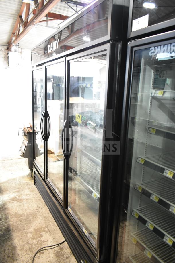 2019 True GDM-72-HC 3-door cooler merchandiser, 115V, commercial-grade, excellent condition, glass doors, shelving.