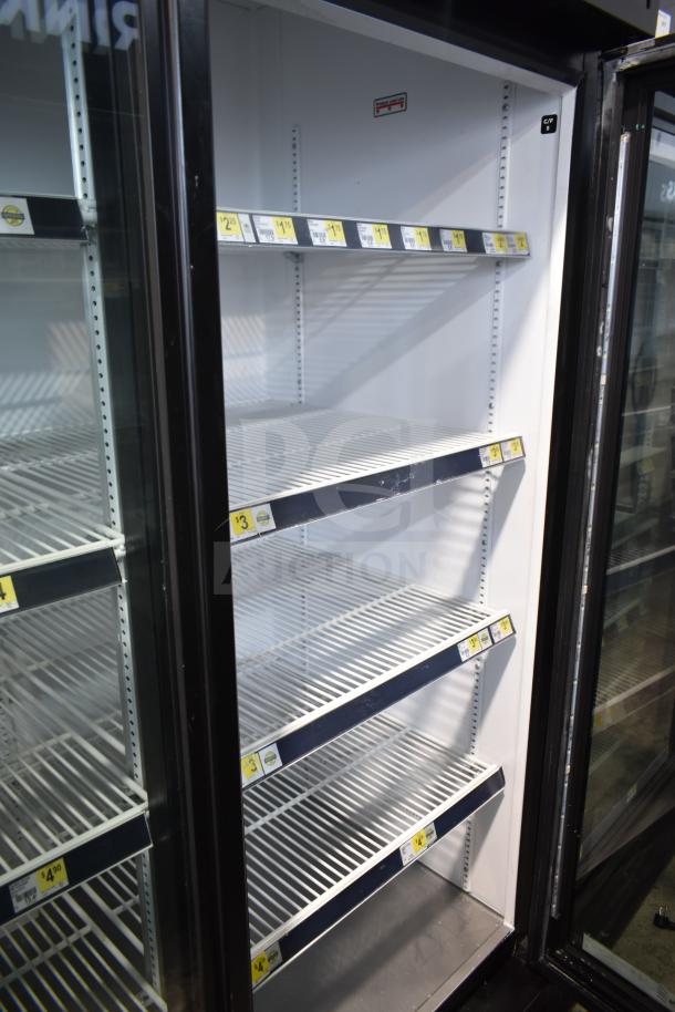 2019 True GDM-72-HC 3 door reach-in cooler, commercial grade, excellent condition, adjustable shelves, 115 volts, 1 phase.