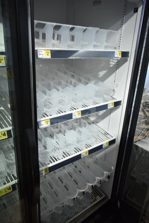 2019 True GDM-49-HC commercial 2-door cooler merchandiser with shelving, excellent condition, 115 volts, 1 phase.