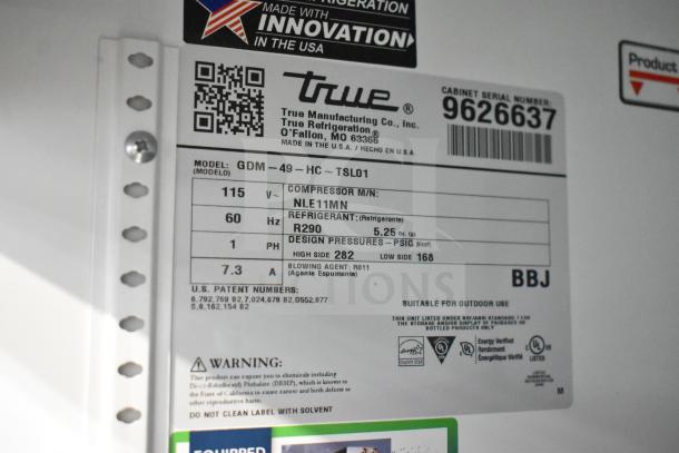 2019 True GDM-49-HC Cooler, 2-door, 115V, 1 Phase. Label reveals model, refrigerant type R290, and energy certifications.