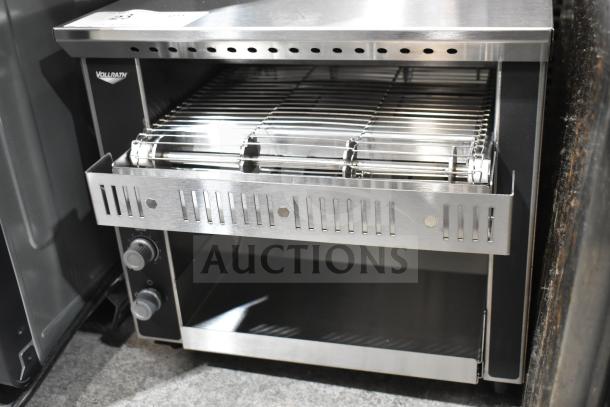 Brand new Vollrath commercial conveyor toaster oven, stainless steel, slight scratches, adjustable controls, branding visible.