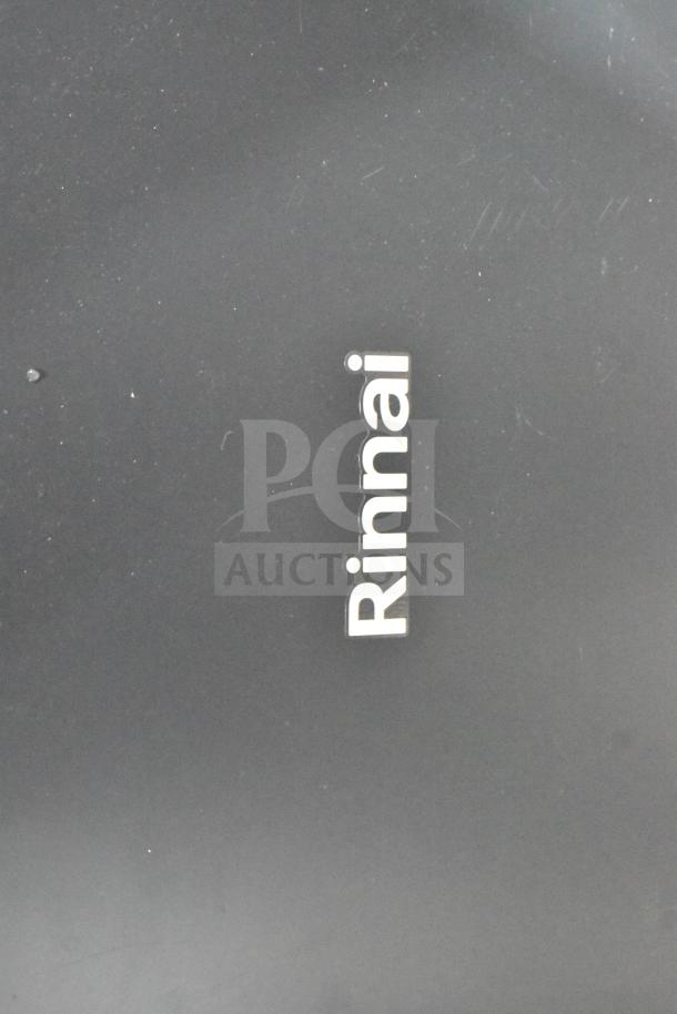Alt text: Rinnai CX199i tankless water heater, brand new with minor scratches. Suitable for indoor/outdoor use, compatible with natural gas or propane.