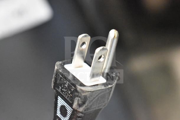 Close-up of the plug from the Rinnai CX199i tankless water heater.