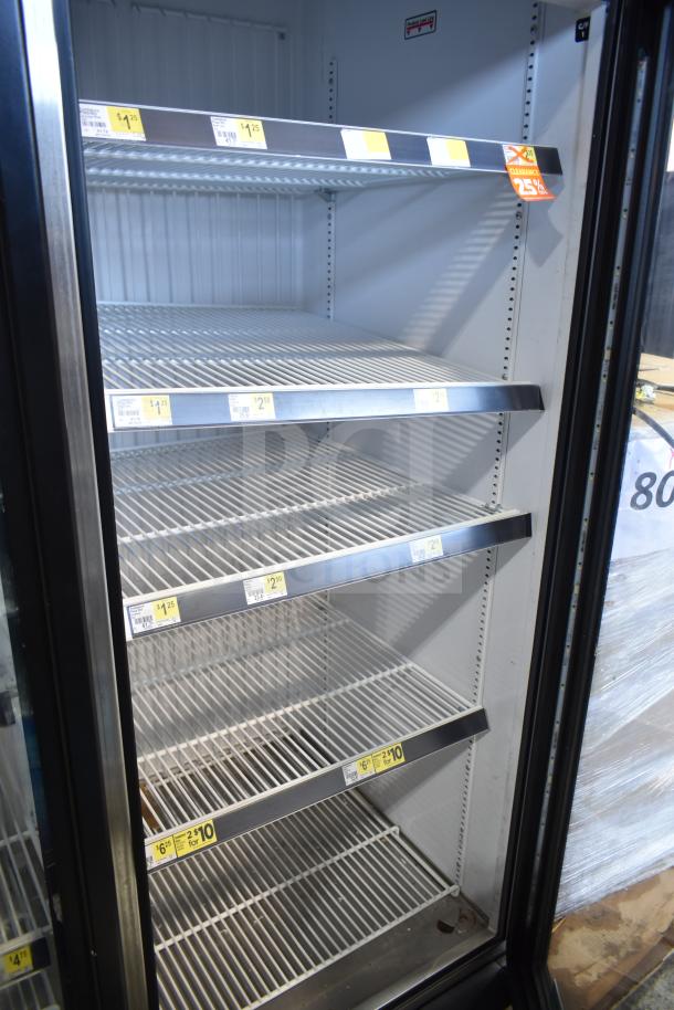 2019 True GDM-72F-HC freezer merchandiser with 3 doors, spacious interior, adjustable wire shelves, excellent condition.