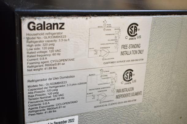 Galanz GLR33MBKE23 Mini Cooler label showing specs: 3.3 cu.ft, 120 VAC, 60 Hz, R600a refrigerant.